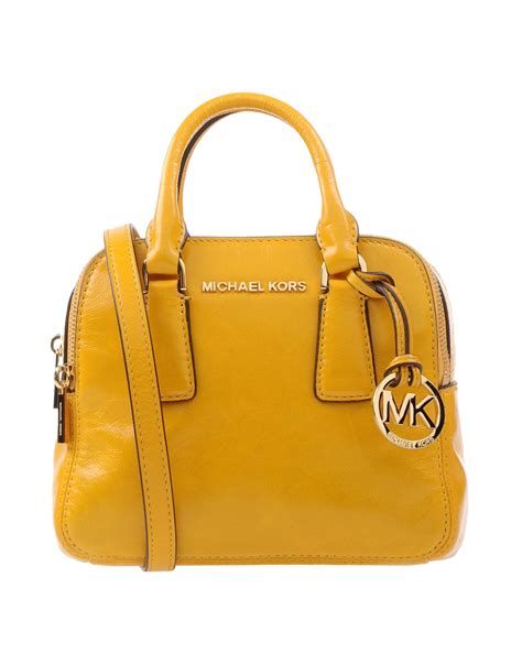 Michael kors yellow handbag + FREE SHIPPING .